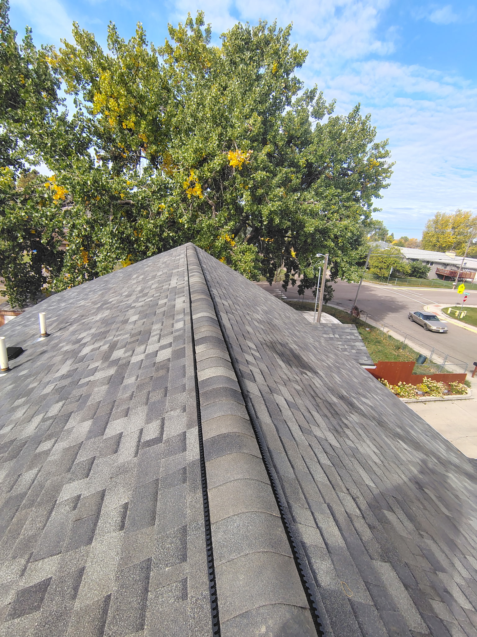 Ridge view of the finished Malarkey Vista roof.